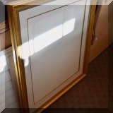 D06. Gold frame.
